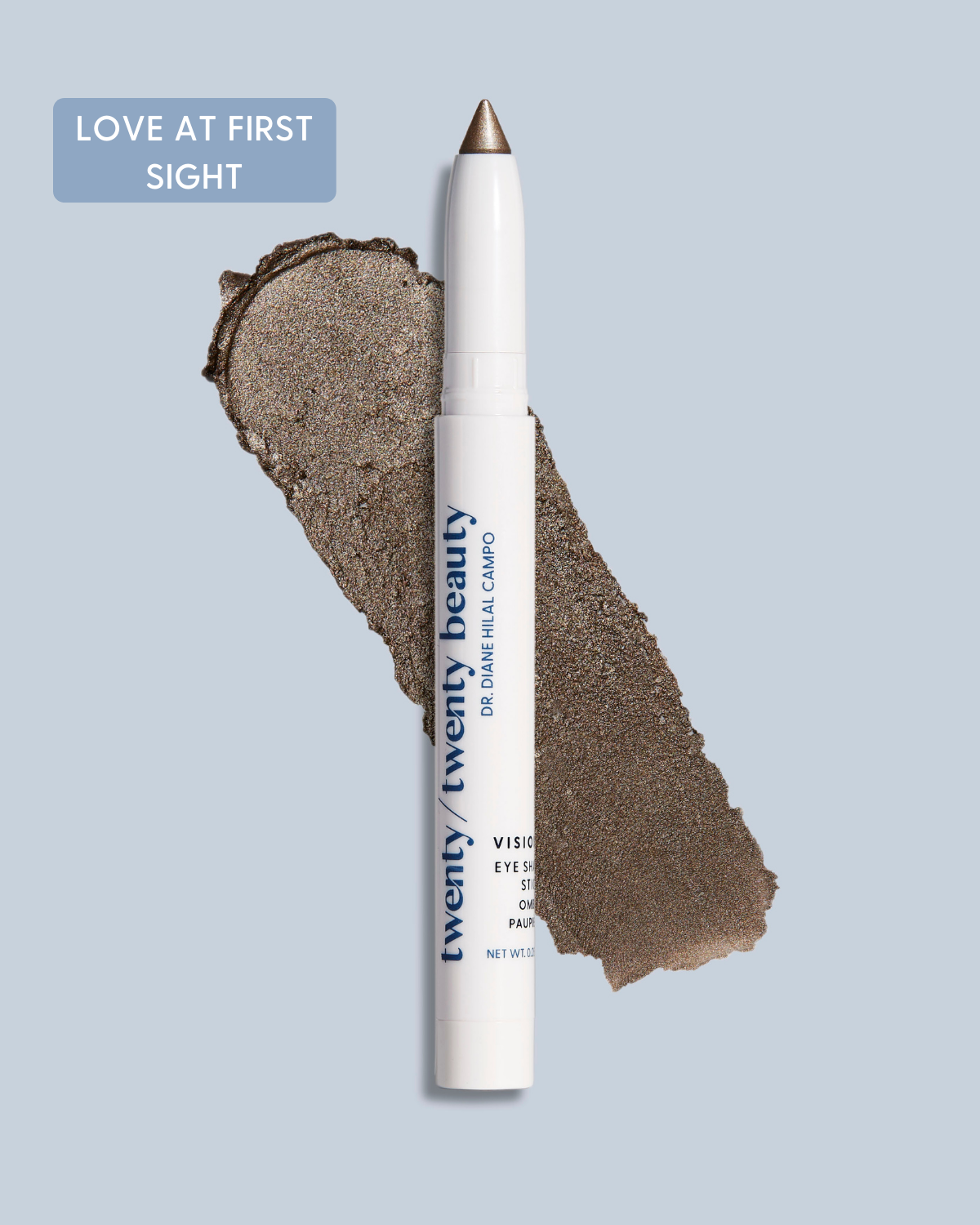 Cream eyeshadow stick texture swipe of Love at First Sight shade is a smokey grey beige with a shimmer finish and easy-glide formula